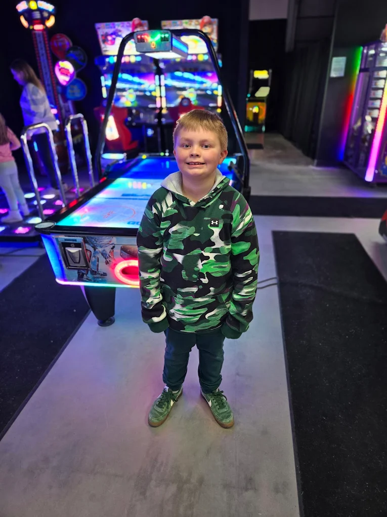 A young player inside Level 99 Arcade.